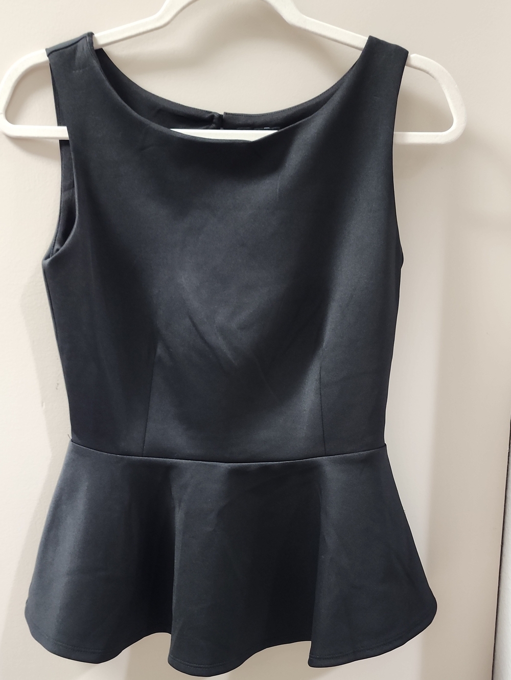 Bisou Bisou Black Sleeveless Peplum Top